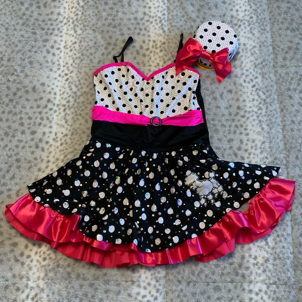 Swing dance jazz poodle polka dot dance skating.